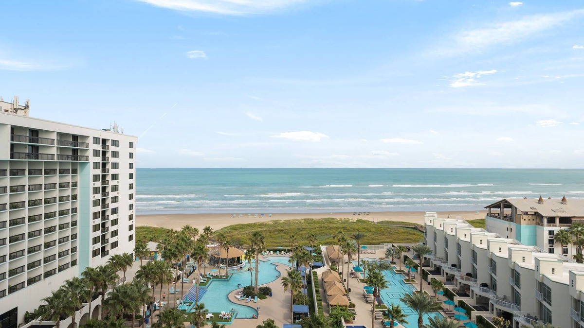 South Padre Island Condo | NEW! Prestigious Luxury * Beach & Bay Patios * XL Size