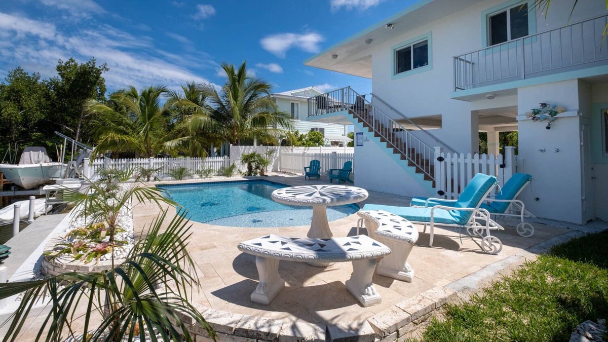 White Marlin Beach House | New saltwater pool, pet friendly, waterfront house with dock
