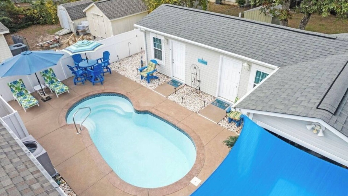 Tranquil Harbour House | New to rental market~Cozy beach bungalow with private HEATED pool & golf cart.