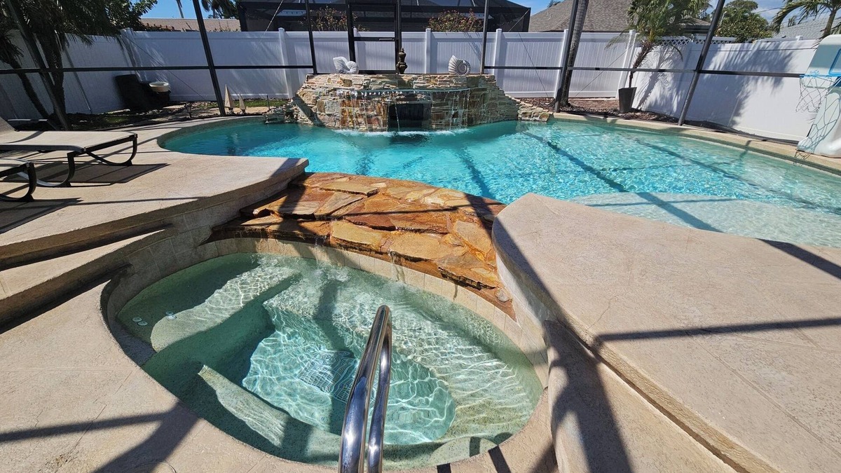 Naples Park House | NEW! Upscale House, Spectacular Heated Pool & Spa, FREE Bikes, Amenities, Beach