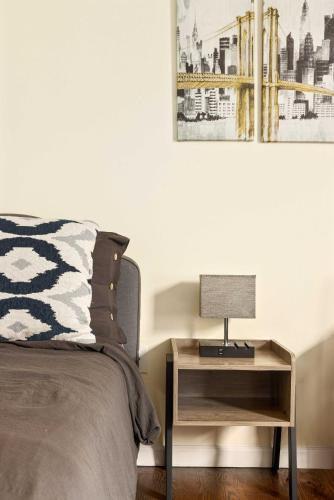 Newark House | Newark Gem Pearl 3BR, 2BA - Sleeps 10 - Walk to Prudential Center and Newark Penn Station, Near EWR and American Dream Mall, includes WiFi - Laundry - Backyard - Gym