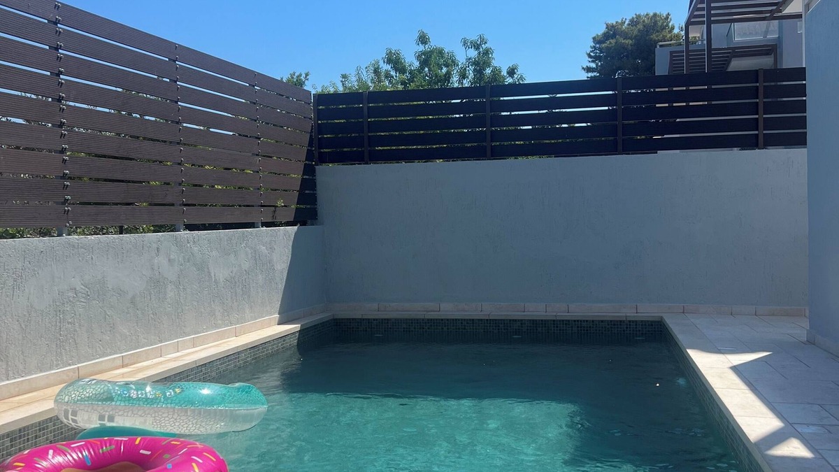 Souvala Villa | Newly built apartment with a private pool and garden, part of a villa.