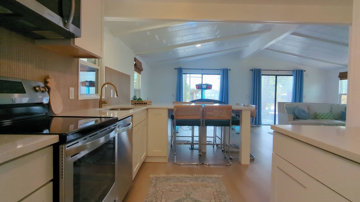 Cocoa House | Newly renovated home with air hockey, games, huge TV wall,fenced yard+screenroom