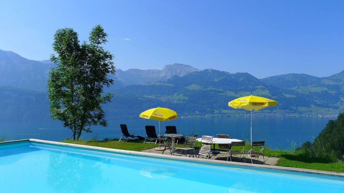 Gersau Apartment | Nice apartment for 2 guests with WIFI, pool, TV, balcony and parking