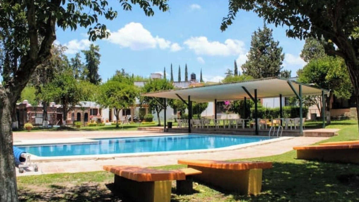 La Magdalena House | Nice house in front of the pool, lake and green area!