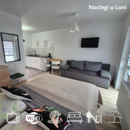 Pobierowo Apartment | Noclegi u Loni- pokoje studio w zacisznym centrum nad morzem z parkingiem