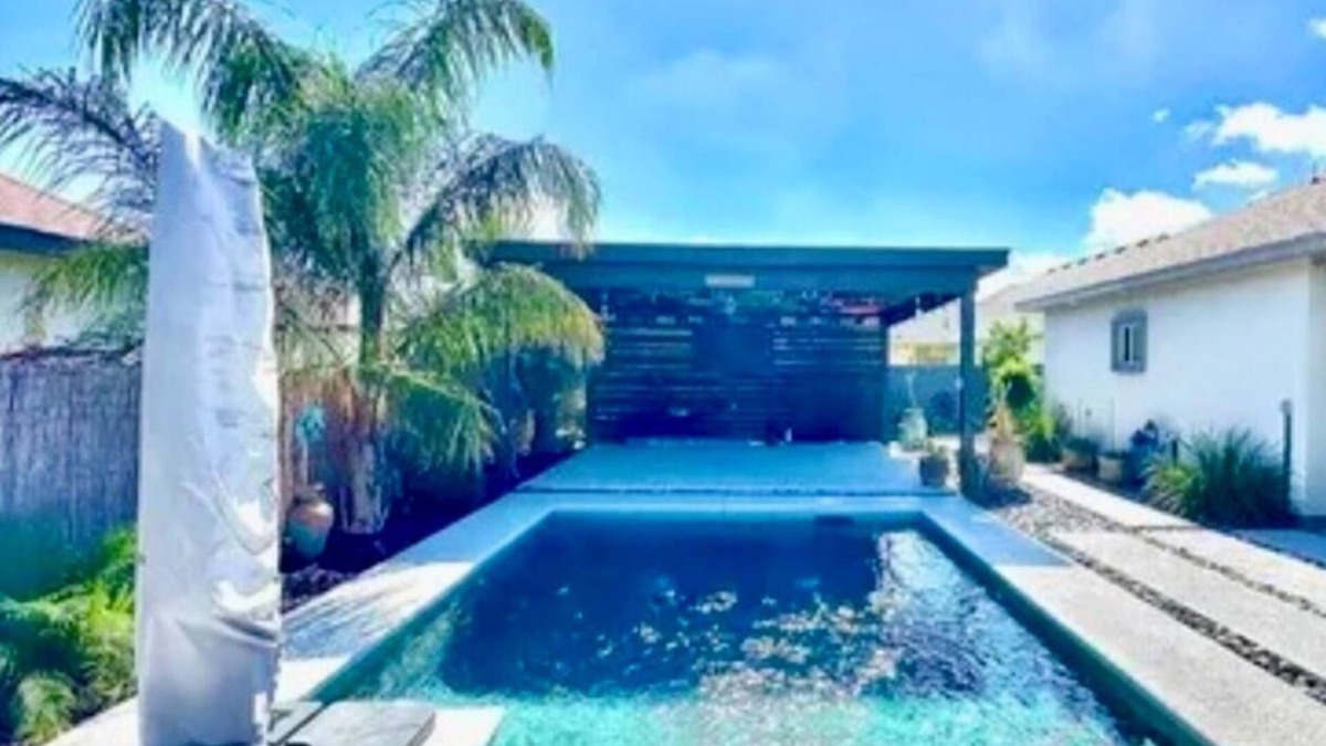 Brownsville House | North Brownsville home with pool and pergola.nBeautiful backyard oasis feeling.