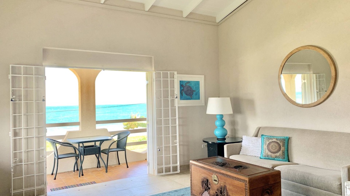 Green Garden Apartment | Ocean facing spacious One Bedroom Apt two minutes walk to the beach