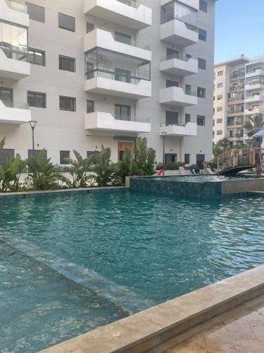 Ain Harrouda Apartment | Ocean park , Luxury fully furnished one bedroom next to zenata beach with five avialable swimming pool at the compound