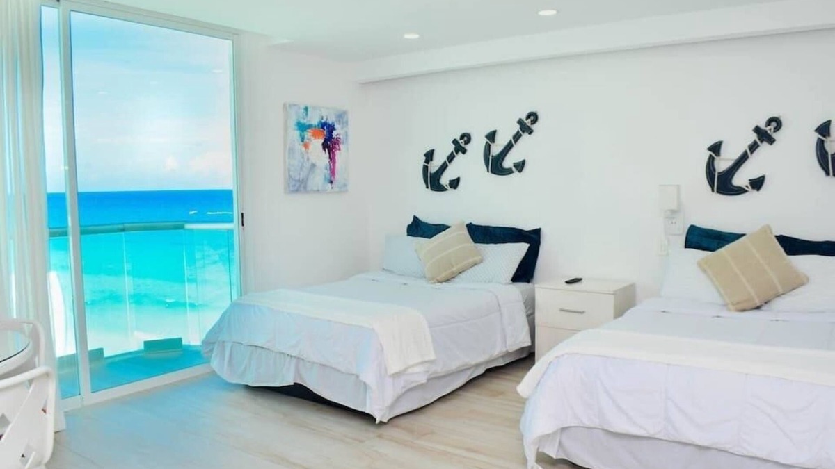 Zona Hotelera Condo | Ocean view studio, great views, balcony, beach, pool, gym, jacuzzi