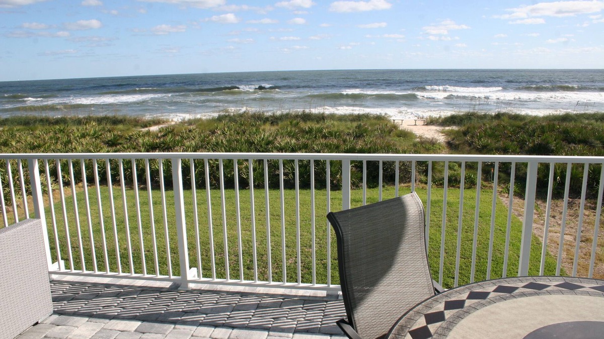 Palm Coast House | Oceanfront Executive Home with private beach and backyard dunes.