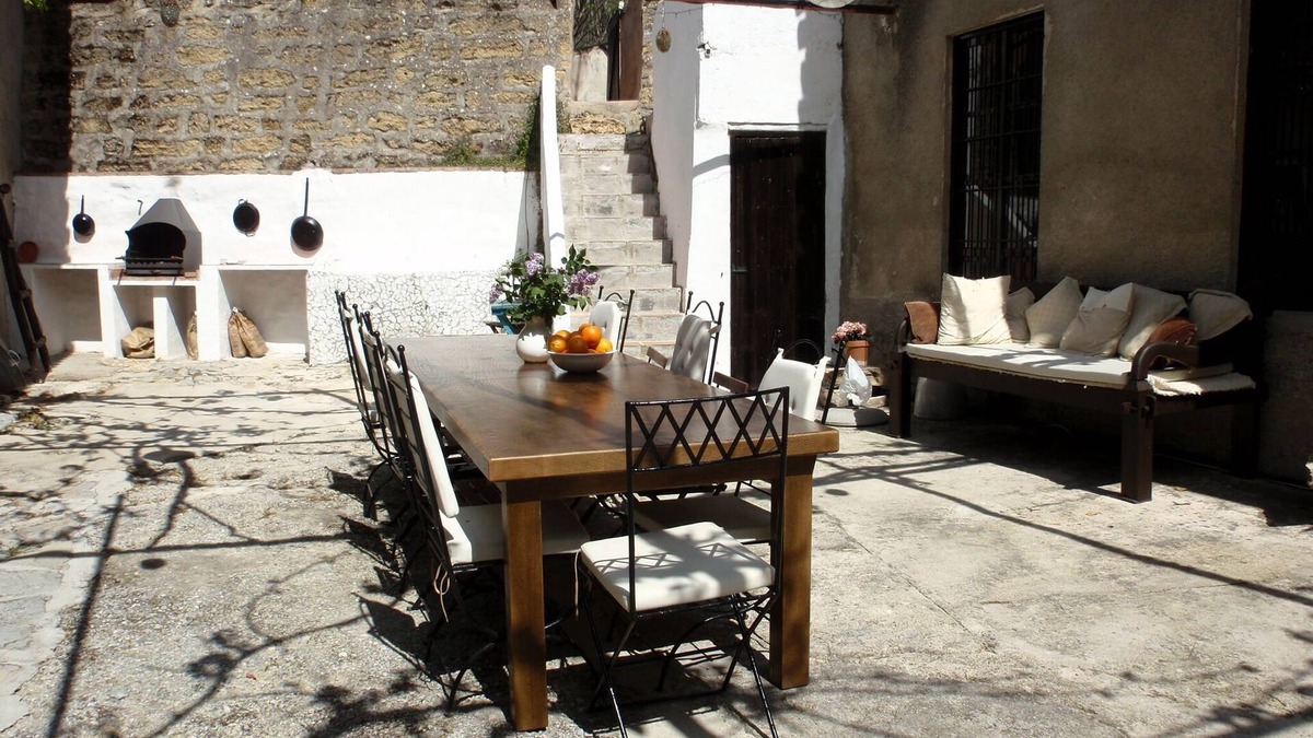Montefrio House | Old mill, restored in a contemporary rustic style