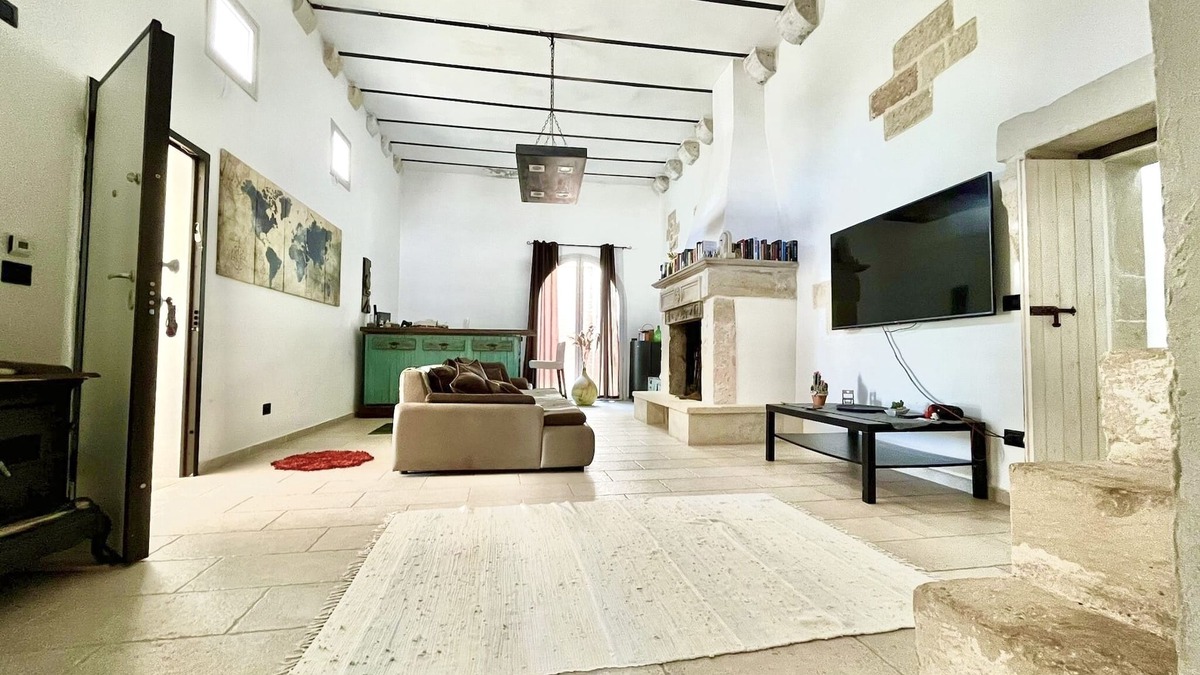 Lequile House | Old renovated millstone with jacuzzi
