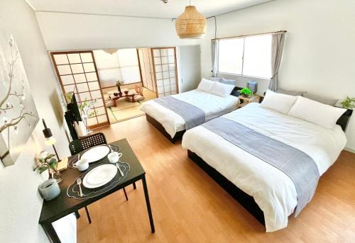 Shin-Osaka Apartment | OMOTENASHI STAY OSAKA 41m2 1LDK 十三駅徒歩1分 梅田2分 神戸京都アクセス良好 和室のある家
