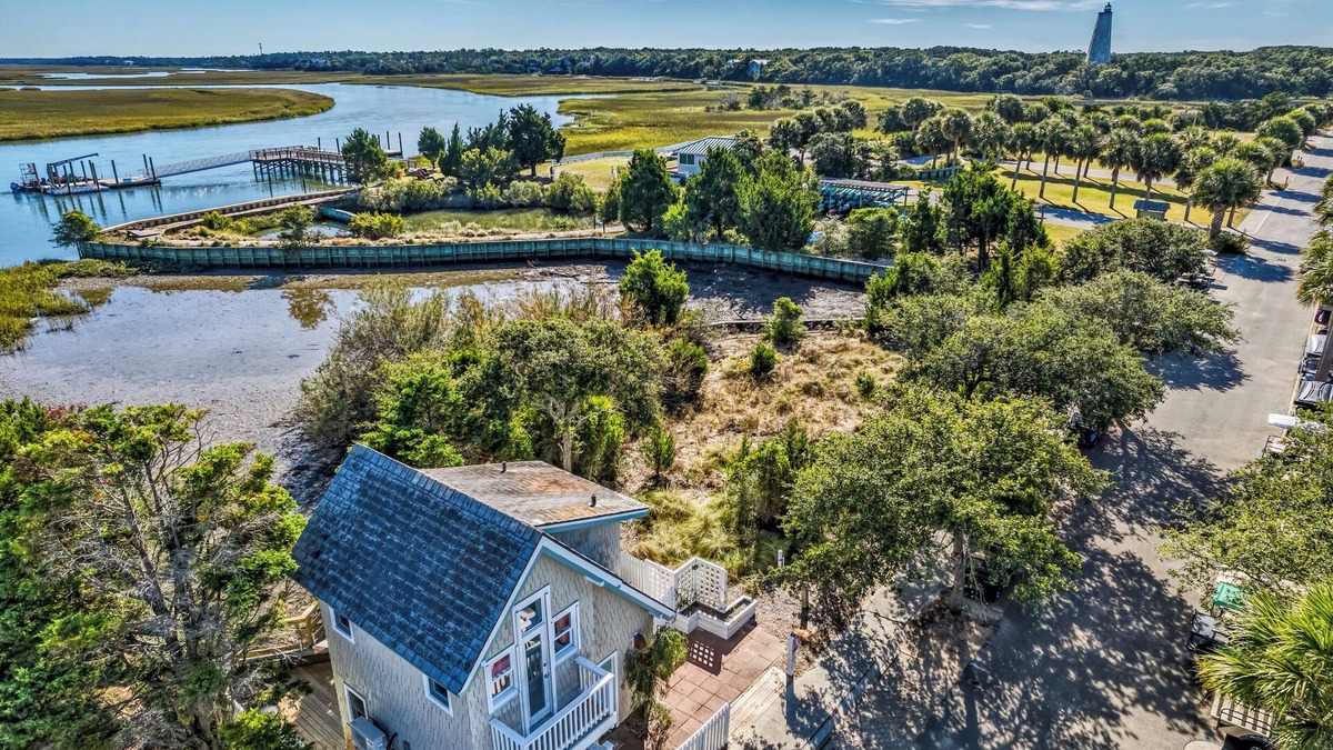 Bald Head Island House | One bedroom oasis with marina and marsh views! Heart of the island with one golf cart