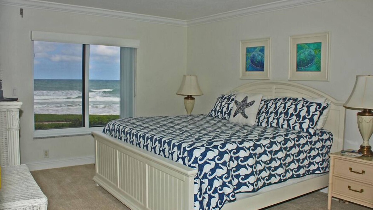 New Smyrna Beach Condo | One of a kind ground floor, three bedroom, three bath corner. Amazing south east ocean views.
