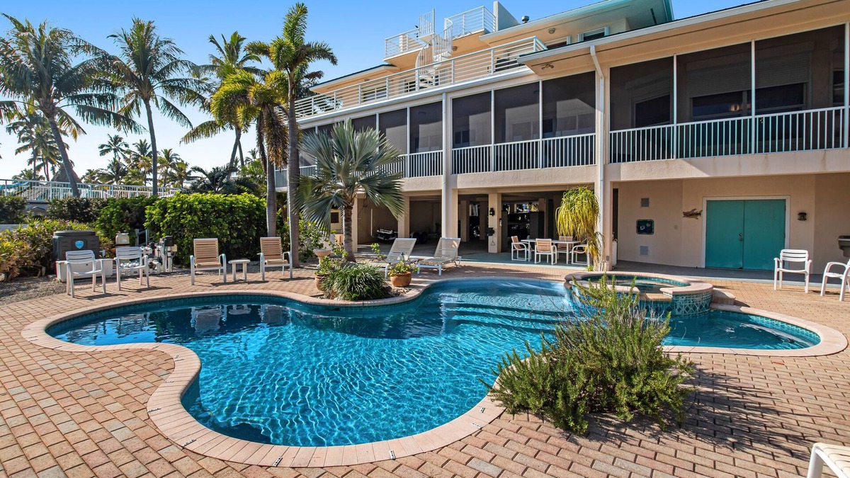 Islamorada House | Opulent waterfront estate with dock, pool, hot tub & rooftop view - dog-friendly