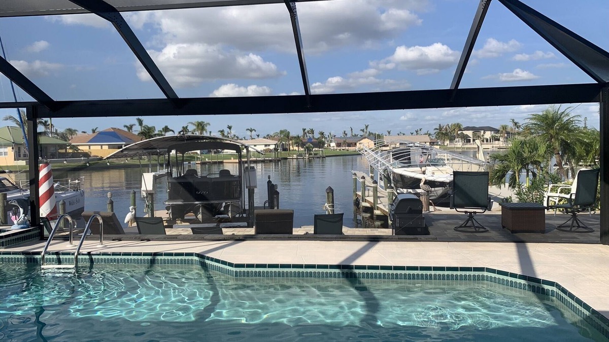 Caloosahatchee House | Orchid Lighthouse Canal Pool home with New waterfront Patio!