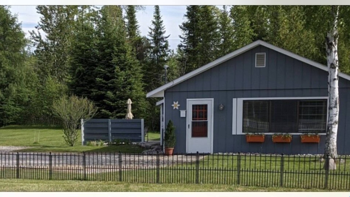 Rapid City Cottage | Overlooking Torch Lake sandbar