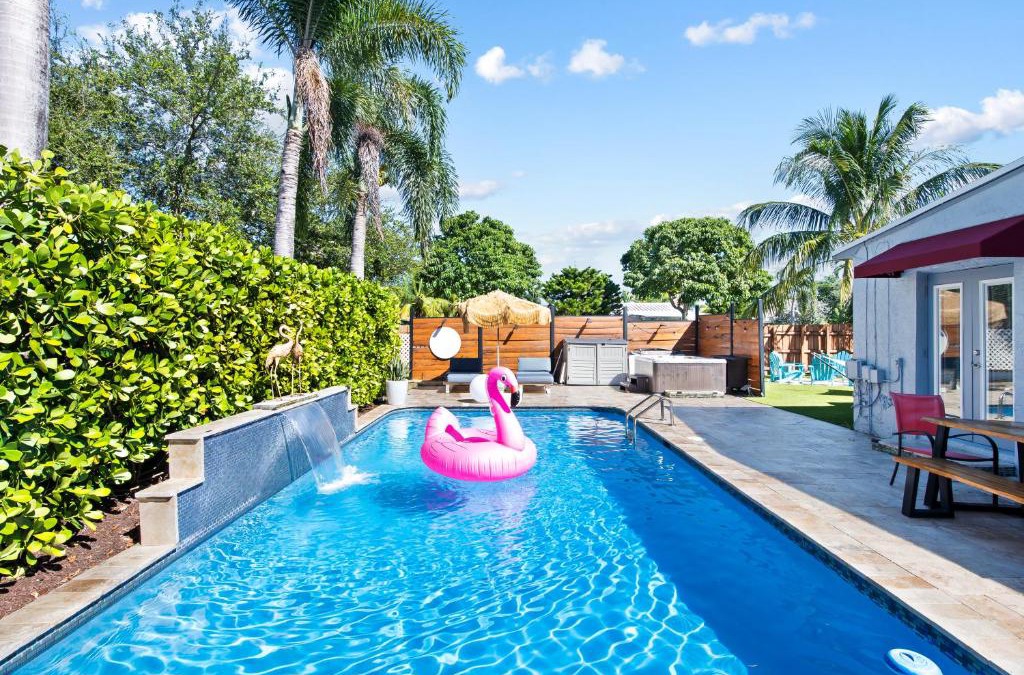 Poinsettia Heights Villa | Palms Retreat! Giant Heated Pool-HotTub-FirePit-5Min2Beach-Pets-EV Chgr