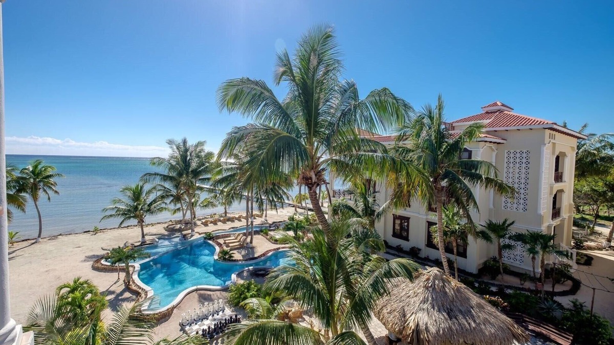 San Pedro Resort | PARADISE FOUND! Tropical 2 bed 2 bath beachfront with pool