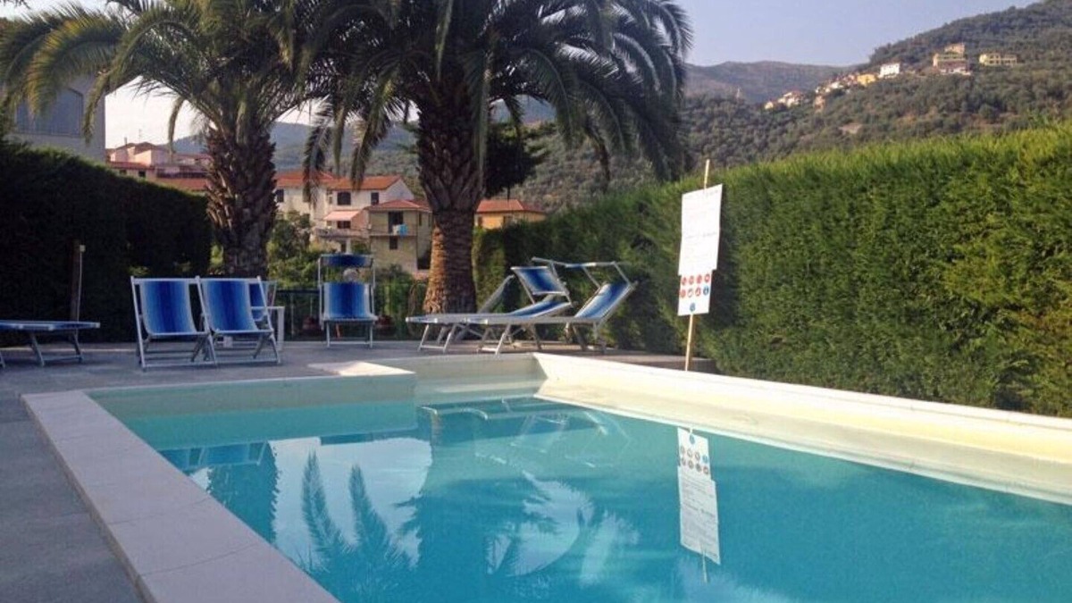 Strada Nazionale Sud House | Part of a villa with pool.