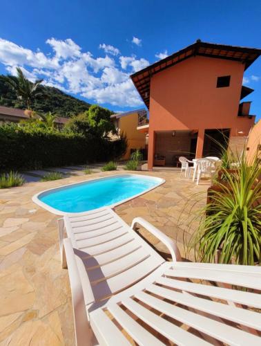 Guarda do Embau House | Partiu Praia SC piscinas privativas, ar condicionado, internet, próximo ao mar e centrinho três minutos a pé