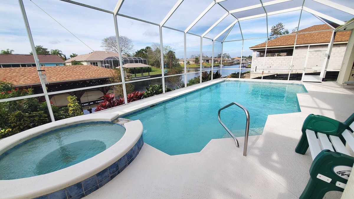 Palm Harbor House | Peace of Paradise, Heated Saltwater Pool, Canal Home, Close to the Beach