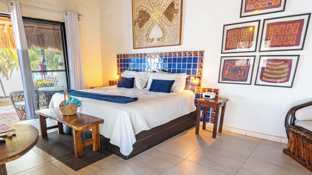 Isla Mujeres Cottage | Peaceful cottage on the beach,heated pool, tropical gardens and sunsets