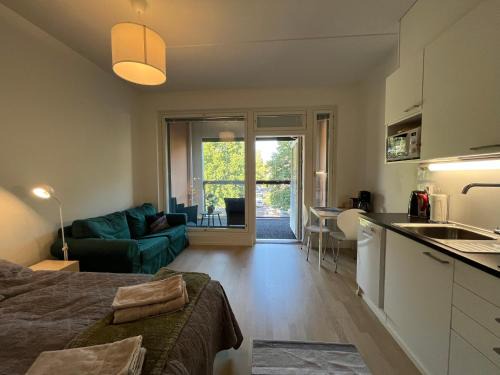 Kaakkoinen District Apartment | Peaceful stay near city & nature, Wifi, balcony