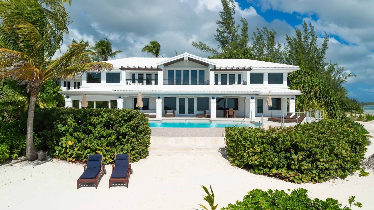 Bodden Town Villa | Pease Bay House: Beachfront Villa w/Private Tennis Court, Infinity Pool + Backyard Snorkeling
