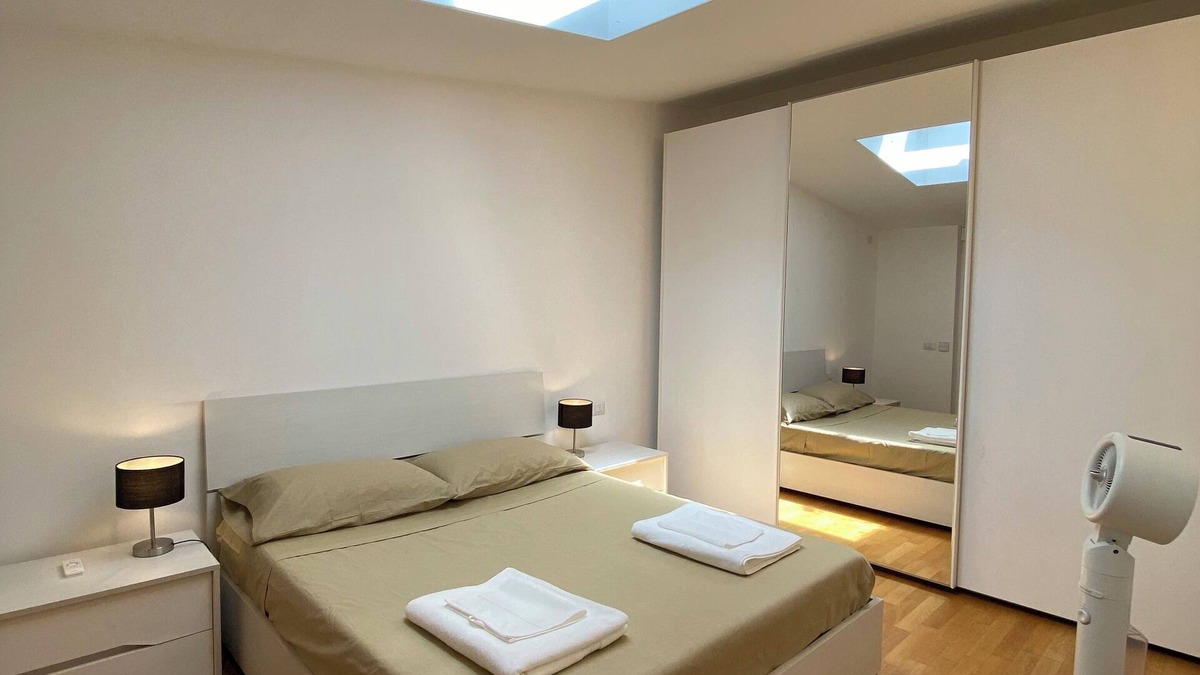 Affori Apartment | Penthouse with bath, parking space and subway under the house