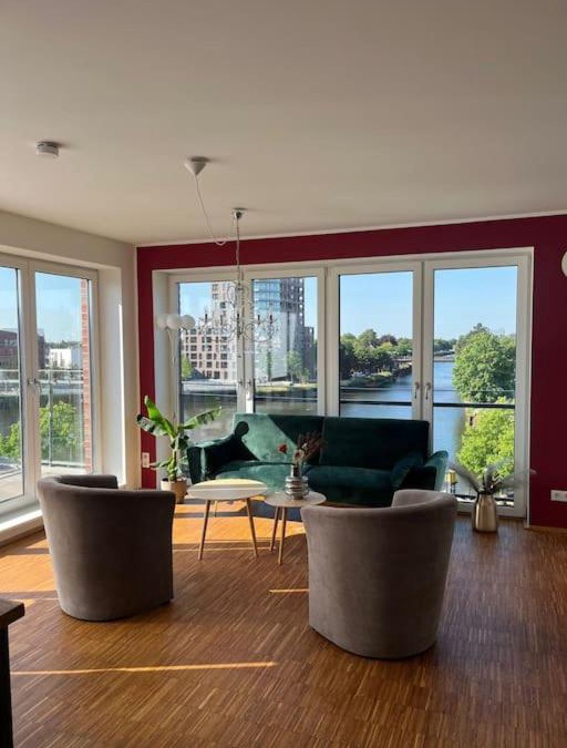 Bahnhofsviertel Apartment | Penthouse-Wohnung mit Flussblick