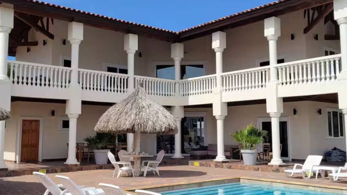 Kamay Villa | Perched on a hill in Noord, this villa is a 6-bed, 7-bath luxury retreat just minutes from Palm Beach. With 5,500 sq. ft. of indoor comfort plus expansive outdoor living, this private villa blends upscale elegance with island charm.