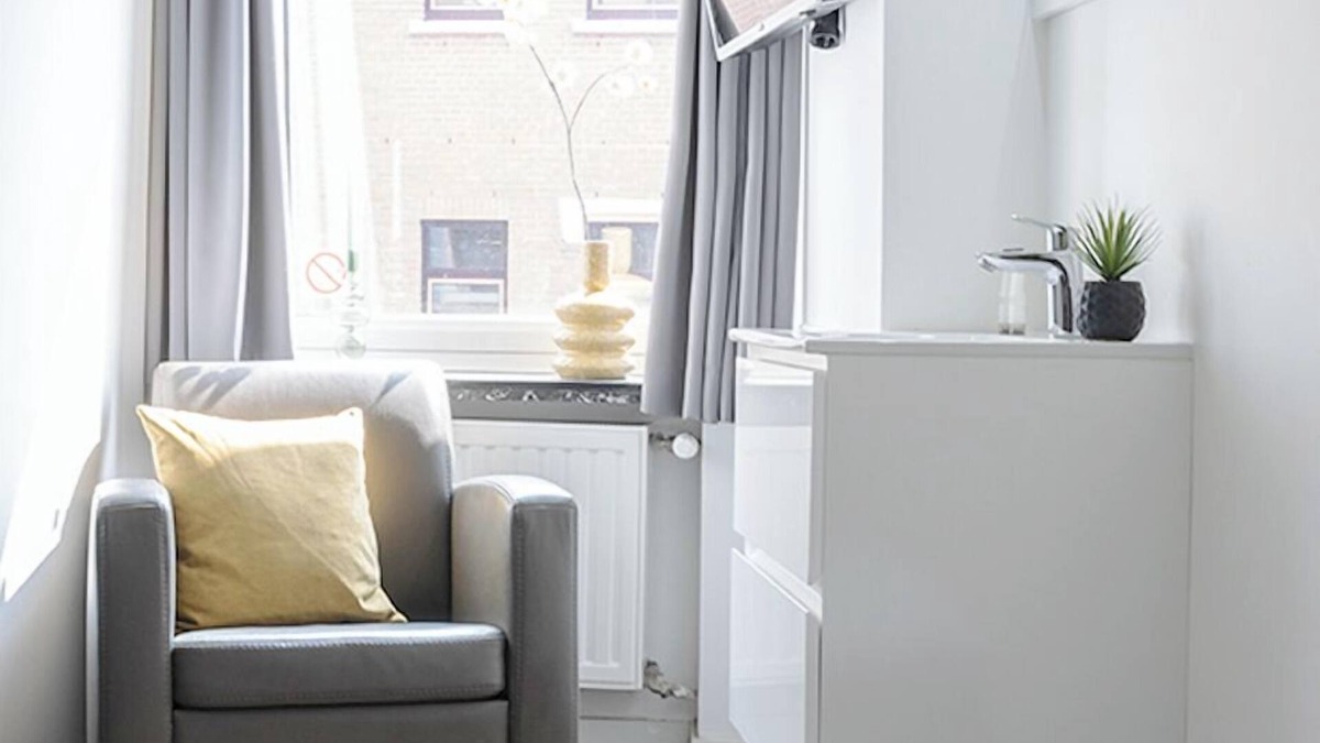 Centrum Apartment | Perfect for solo travelers looking for a simple and budget-friendly base. This cozy room comes with a TV and workspace, and you’ll have access to a shared kitchen and shared bathroom.
