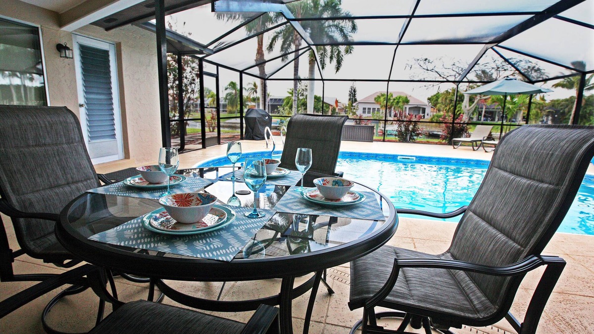 Cape Coral House | Perfect vacation getaway! Great location! Pool. On a wide gulf access canal.