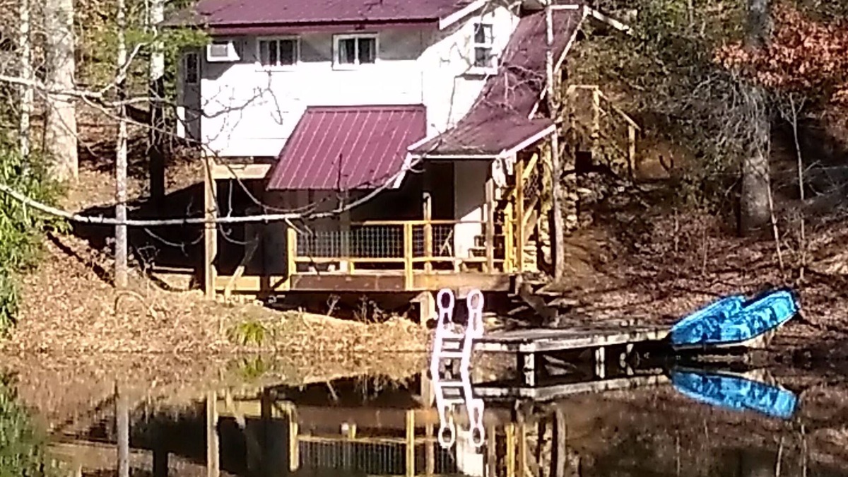 Brevard Cabin | Pet friendly Little House, Fire pit, paddle boat, 2 hammocks, porch swing, grill
