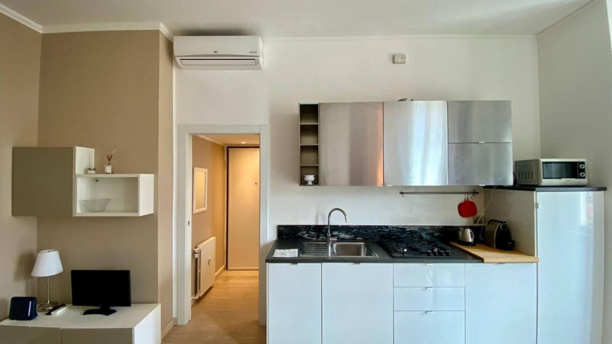 Acquabella Apartment | Piazzale Susa Bright Flat with Veranda