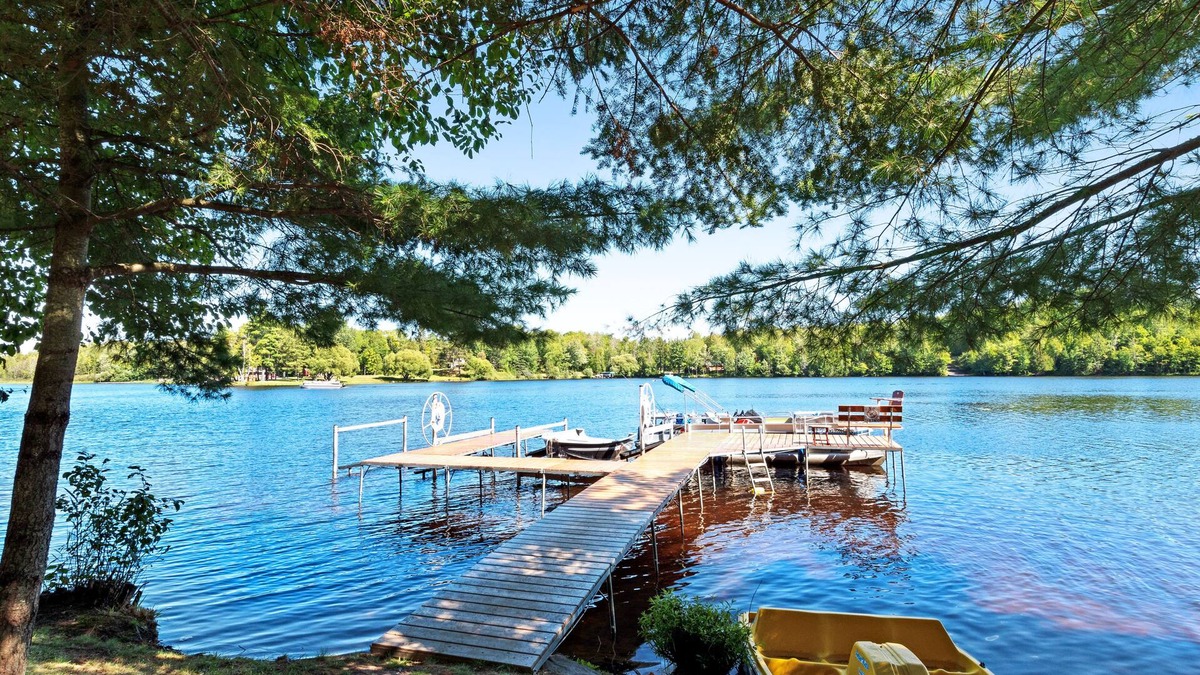 Presque Isle Cabin | Picturesque waterfront cabin w/a deck, firepit, & recreational pier