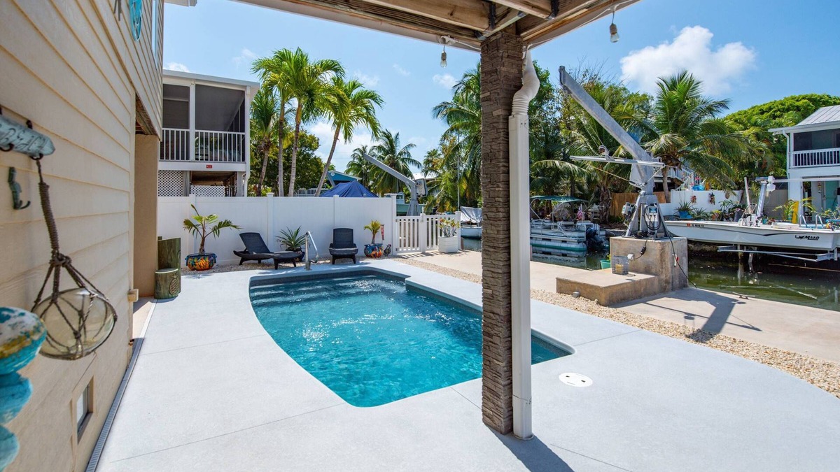 Cutthroat Harbor Estates House | Pirate’s Paradise: Waterfront 3BR Retreat on Cudjoe Key with Heated/Chilled Pool & Boat Dockage