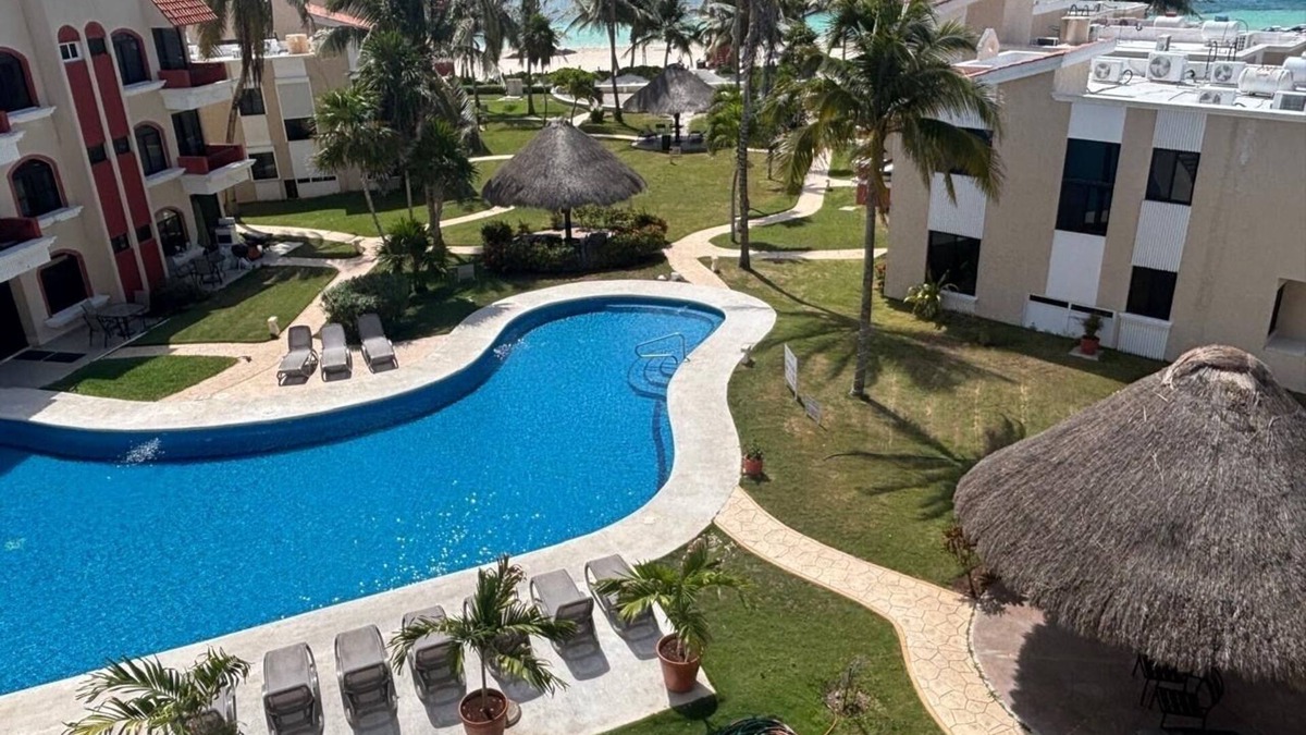 Puerto Morelos Condo | PlayaSol Beachfront Condo with large pool, steps to beach, walk to town square