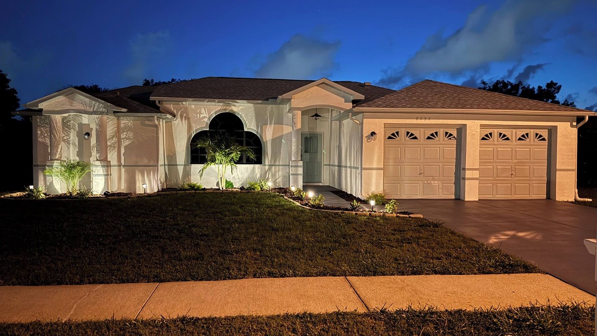 Orchid Lake Village House | Pool and Fishing Lake Oasis
