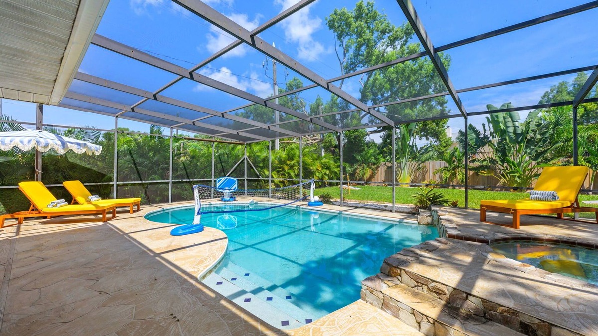 Palm Harbor House | Pool, games & more—fun for everyone!
