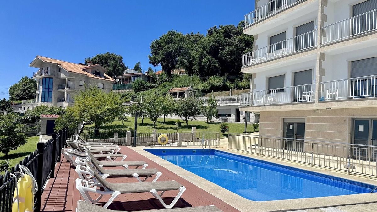 Raxo Apartment | Pool, garden, playground, tennis court and barbecue. 400 m. the beach