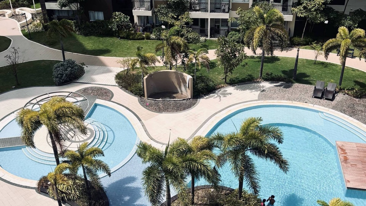 Mandurriao Condo | Pool & Garden Tranquility