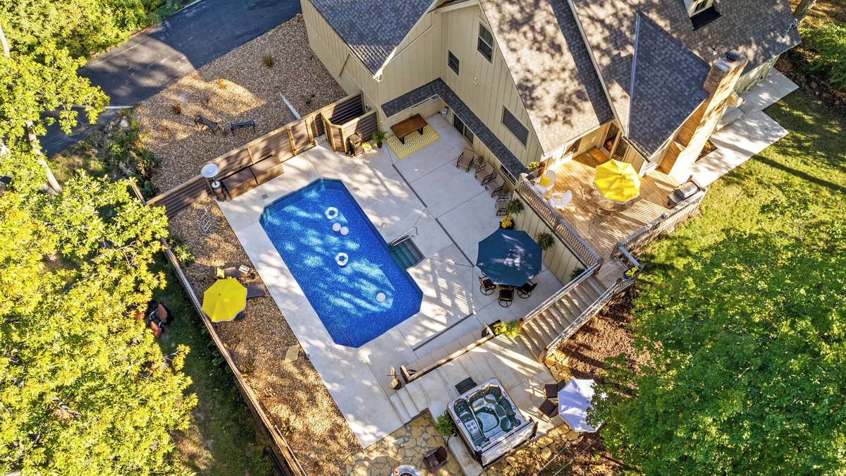 Merriam House | Pool & Hot Tub in the heart of KC! Tons of stylish space inside and out!