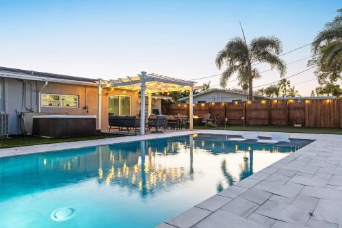 Deerfield Beach House | Pool Hot Tub Putting Green near Deerfield Beach Oasis on Fourth by AvantStay