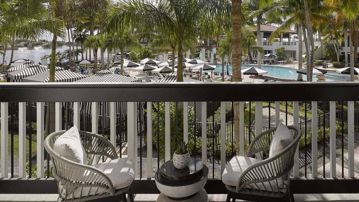 Hunt Club Hotel | Pool View Room Two Queen Room at PGA National Resort - Outdoor Fun!