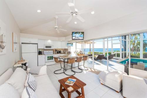 Rum Point House | Pools of the Kai 6 - Beachfront Condo with Private Pool Atrium, Modern Kitchen, and Outdoor Grill