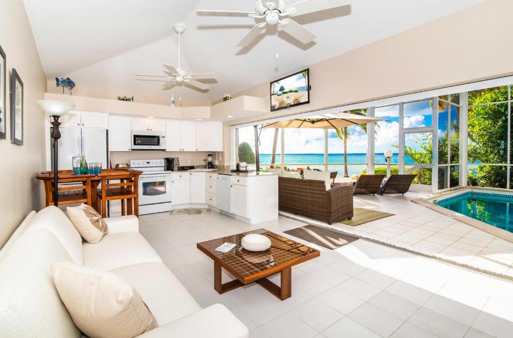 Rum Point Apartment | Pools of the Kai 3 - Waterfront Condo with Private Pool Atrium, Walk to Restaurants